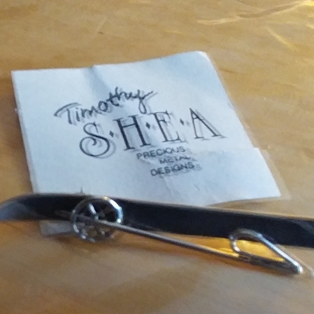 Skiers sterling silver pin by Timothy Shea